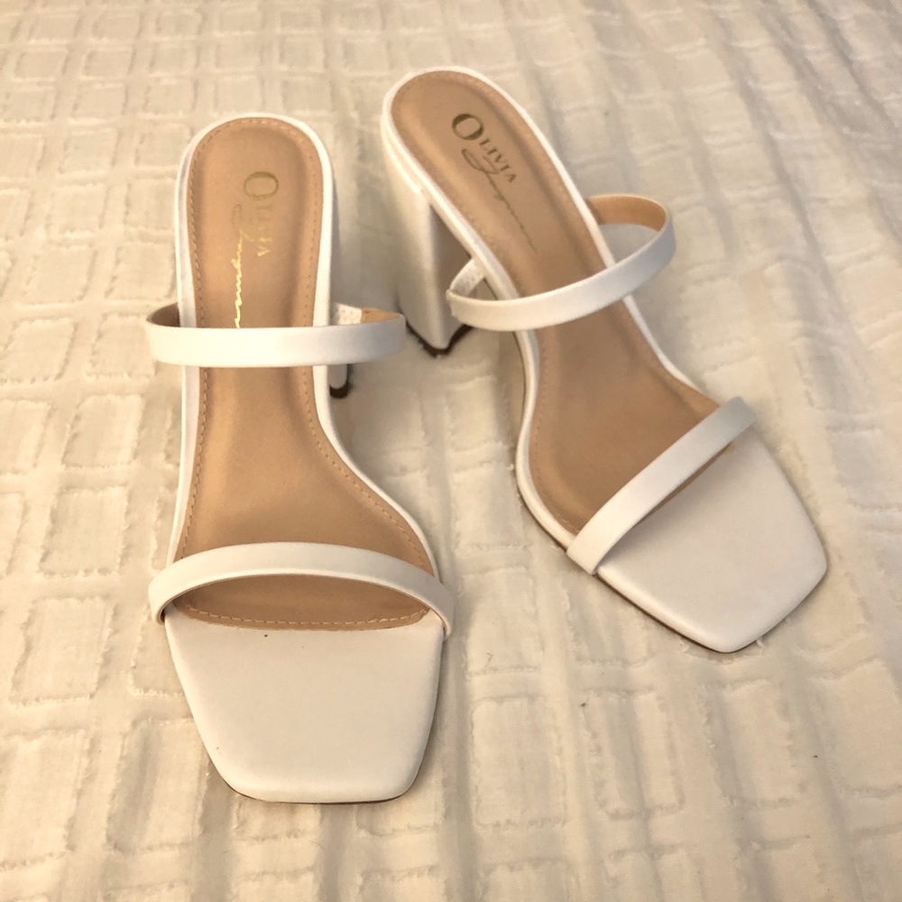 White square toe Olivia Ferguson block heels.